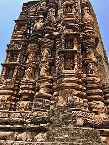 Detailed carvings on the wall 9th century reliefs on exterior wall of Bhand Deul Jain brick temple, Arang Chhattisgarh 5.jpg