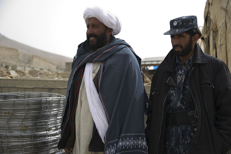 File:Abdul Samad, left, a recently reintegrated Taliban commander, and Afghan policeman Nic Mohammed, the commander of the Afghan Local Police in Khas Uruzgan, inventory supplies in Khas Uruzgan district, Uruzgan 120304-N-JC271-051.jpg