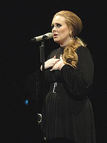 Adele performing "Someone Like You" during a concert in Seattle, Washington. Adele someone like you - Cropped.jpg