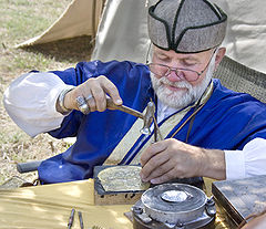 Master coppersmith at work
