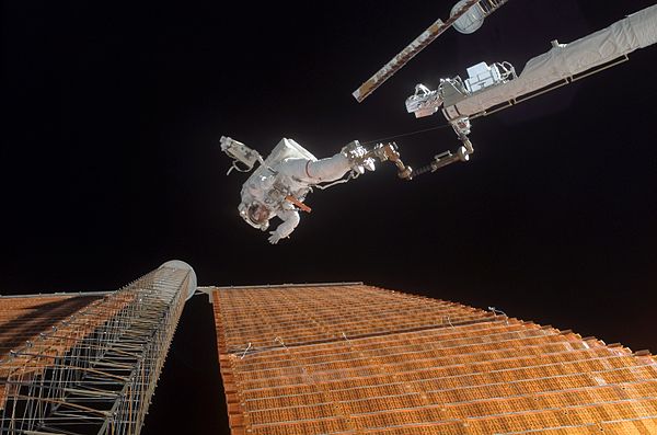 Scott Parazynski during an STS-120 spacewalk to repair a damaged solar panel of the International Space Station.