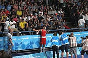 Deutsch: Boxen bei den Olympischen Jugendspielen 2018 Tag 12, 18. Oktober 2018 - Kampf um Bronze im Leichten Weltergewicht Jungen – Hassan Azim (Großbritannien, rot) schlägt Mohammed Boulaouja (Marokko, blau) RSC; Ringrichter ist Wulfren Olivares Peréz (Kolumbien). English: Boxing at the 2018 Summer Youth Olympics on 18 October 2018 – Bronze Medail Match Light Welterweight Boys - Hassan Azim (Great Britain, red) beats Mohammed Boulaouja (Morocco, blue) RSC; Referee is Wulfren Olivares Peréz (Columbia). Español: Boxeo en los Juegos Olímpicos Juveniles de Verano de 2018 en 18 de octubre de 2018 - Medalla de bronce de los hombres ligeros de peso welter: Hassan Azim (Gran Bretaña, rojo) vence a Mohammed Boulaouja (Marruecos, azul) RSC; El árbitro es Wulfren Olivares Peréz (Colombia).