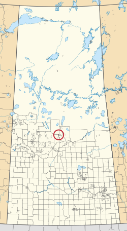 Mapa provincie Saskatchewan zobrazující 297 venkovských obcí a stovky malých indických rezerv. Jeden je zvýrazněn červeným kruhem.