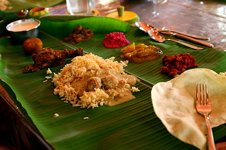 A Chettinad feast reflecting the cuisine of Tamil Nadu's south coast served on a banana leaf.