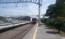 KRL Commuterline train arriving at Nambo Station Commuter Line tiba di Stasiun Nambo.jpg