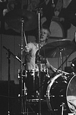 Cook playing with the Sex Pistols in Paradiso, Amsterdam in 1977. CookCropped.jpg