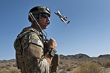 A United States Air Force joint terminal attack controller using a radio to coordinate close air support with an A-10 Thunderbolt II Defense.gov News Photo 110923-F-MQ656-036 - Joint Terminal Attack Controller Tech. Sgt. Aaron Switzer U.S. Air Force uses a radio to communicate with pilots of A-10 Thunderbolt II aircraft.jpg