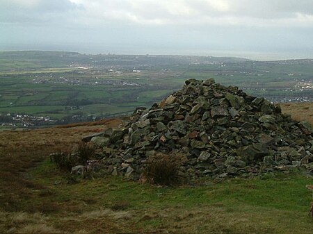 Dent cairn