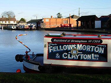 A Fellows Morton & Clayton boat at Gayton Junction, Northampton, repainted in the original company livery Fellows Morton and Clayton Motorboat No.1308 Lily at Gayton Junction.jpg