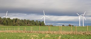 The wind turbines at Findhorn, which make the Ecovillage a net exporter of electricity Findhorn wind turbines (crop).jpg