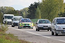 Ford Focus RS WRC on a road section, Rally de France Alsace 2010 Ford WRC sur circulation public.JPG