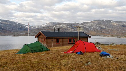 Norwegian obetjent hytte: Gautelishytta in the Narvik fells. Some sleep in their tents outside.