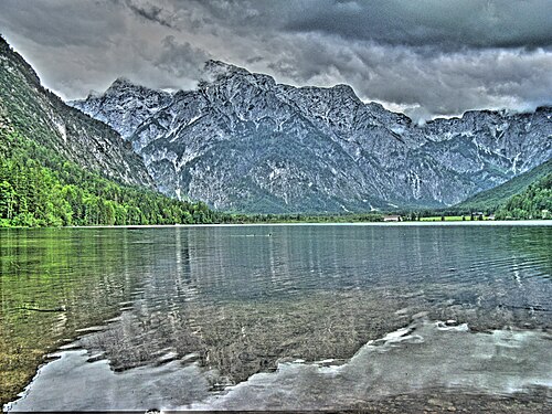 HDR of Austrian mountain over lake.