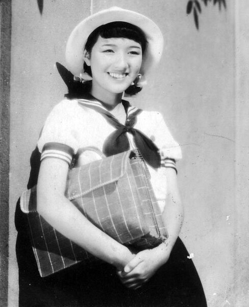 Actress Hideko Takamine, portraying an archetypal shōjo wearing a sailor fuku in the 1939 film Hana Tsumi Nikki [ja]