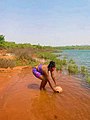 Igbo girl fetching water