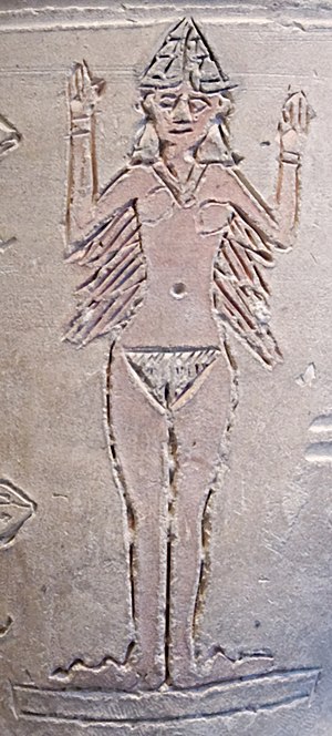 The goddess Ishtar, winged and wearing a version of the horned cap of divinity. Detail of the so-called "Ishtar vase", early 2nd millennium BC (Louvre AO 17000)[15]