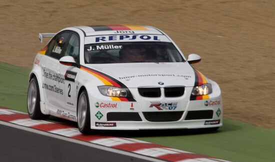 Müller driving the BMW 320si WTCC car at Brands Hatch in 2008.