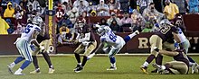 Lawrence about to sack Kirk Cousins in a game against the Washington Redskins in 2017 Kirk Cousins vs Cowboys 2017 (2).jpg