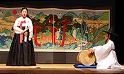 The performance of the Pansori, a genre of Korean traditional music, can last up to eight hours, as accompanied by a single barrel drum and improvising on texts that combine rural and erudite literary expressions.