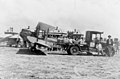 Loading aeroplanes with Christmas supplies for transport to flood bound "Tinnenburra" station in Queensland. Bourke railway station in background - Bourke, NSW, c. 1930 (6535804863).jpg