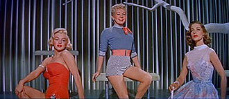 Grable with Marilyn Monroe (left) and Lauren Bacall (right) in How to Marry a Millionaire (1953)