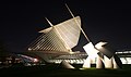 View of the Milwaukee Art Museum at night.