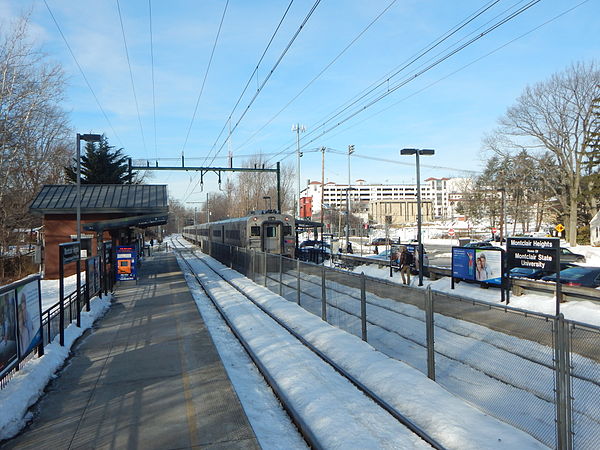 A westbound train departs Montclair Heights in February 2015