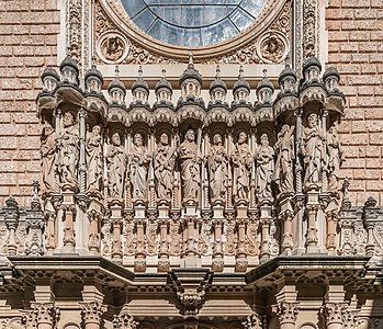 Christ and the Apostles on the facade of the Basilica of Montserrat abbey in commune of Monistrol de Montserrat, Catalonia, Spain