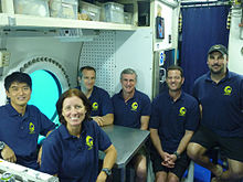 The NEEMO 15 crew. Left to right: Takuya Onishi, Shannon Walker, Saint-Jacques, Steve Squyres, and Aquarius habitat technicians Nate Bender and James Talacek.