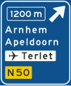 K2: Advance warning sign of a motorway showing the distance to the next exit and destinations after the exit (the top destination is the name of the exit), direction to aerodrome/airport and the road number (non-motorway)