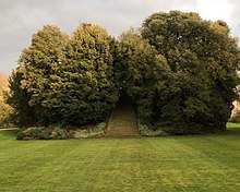 The Garden Mound, famous for the sound produced by clapping beneath it, and up which only Members of the College are permitted New College, Oxford mound.jpg