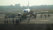 Passengers boarding Nok Air flight at Nakhon Si Thammarat Airport NokAir Get Passenger on NST.jpg