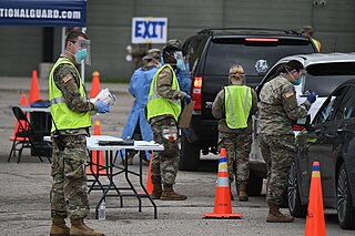 North Dakotans at drive thru COVID-19 testing site North Dakota National Guard (49911019972).jpg