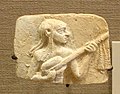 Ein Musiker. Dieses Relief wurde vor etwa 2000 Jahren gemacht.