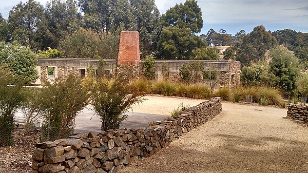 The cafe structure in 2015. A memorial garden has been established at the site.