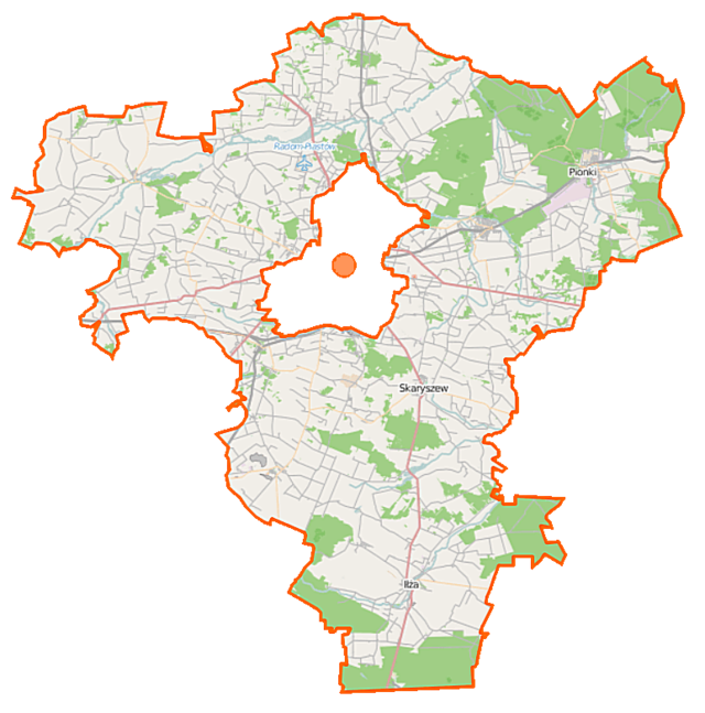 Mapa konturowa powiatu radomskiego, u góry po prawej znajduje się punkt z opisem „Pionki”