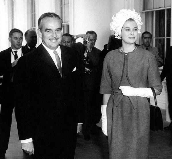 Prince Rainier III and Princess Grace arrive at the White House for a luncheon in May 1961.