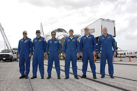 Members of the STS-119 crew pose after landing. L-R: Commander Lee Archambault, Pilot Tony Antonelli and Mission Specialists Joseph Acaba, Steve Swanson, Richard Arnold and John Phillips.