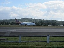 Air Madagascar 737-300 at Sambava Sambava airport-Air Mad 737-300 5R-MFI.jpg