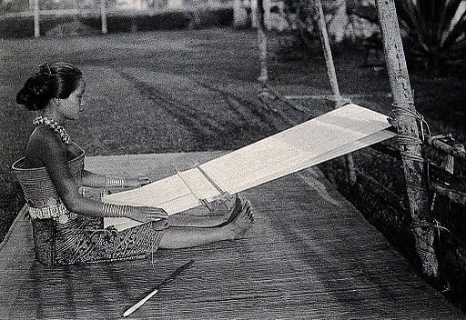 Sarawak; a native girl weaving cotton on a loom. Photograph. Wellcome V0037417ER