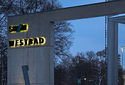 English: Writing of the Westbad in Munich in the early twilight in winter. Deutsch: Westbad - Beleuchteter Schriftzug in der frühen Dämmerung im Winter.