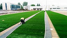 Installation of artificial grass at Sepa Jalgpallikeskus in June 2016 Sepa jalgpallikeskus 06-21 kunstmuru paigaldamine Kalle Paas.jpg