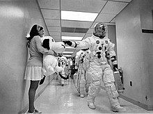 En route to launch, Stafford touches a Snoopy doll