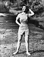 Woman in bermuda shorts, 1952 StateLibQld 1 199919 Young woman modelling a short pantsuit, Brisbane, 1952.jpg