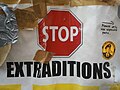 Stop Extraditions, placard in front of Ecuador embassy.jpg