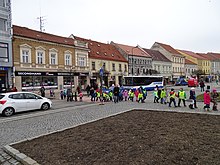 A walking bus in Czechia Trebic, Karlovo namesti, skolka na prechodu.jpg