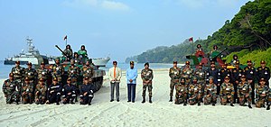 President Ram Nath Kovind, with Lt Gov Adm D. K. Joshi (Retd.) and CINCAN Lt Gen Manoj Pande, at the Joint Services Operational Demonstration by the Integral combat platforms and forces of Andaman and Nicobar Command, at Radhanagar beach, Swaraj Dweep, Andaman and Nicobar in February 2021. The President, Shri Ram Nath Kovind in a group photograph at the Joint Services Operational Demonstration by the Integral combat platforms and forces of Andaman and Nicobar Command, at Radhanagar beach, Swaraj Dweep, Andama.jpg