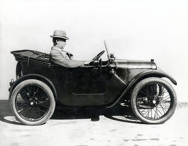 Austin driving an Austin 7