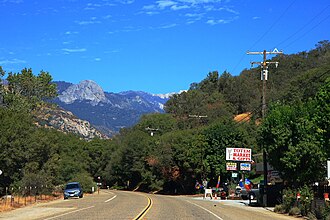 A 2010 view of Three Rivers from California State Route 198, looking northeast toward Sequoia National Park. The monolith looming in the left background is Moro Rock. Three Rivers CA.JPG