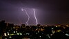 Night panorama during a thunderstorm in the rainy season